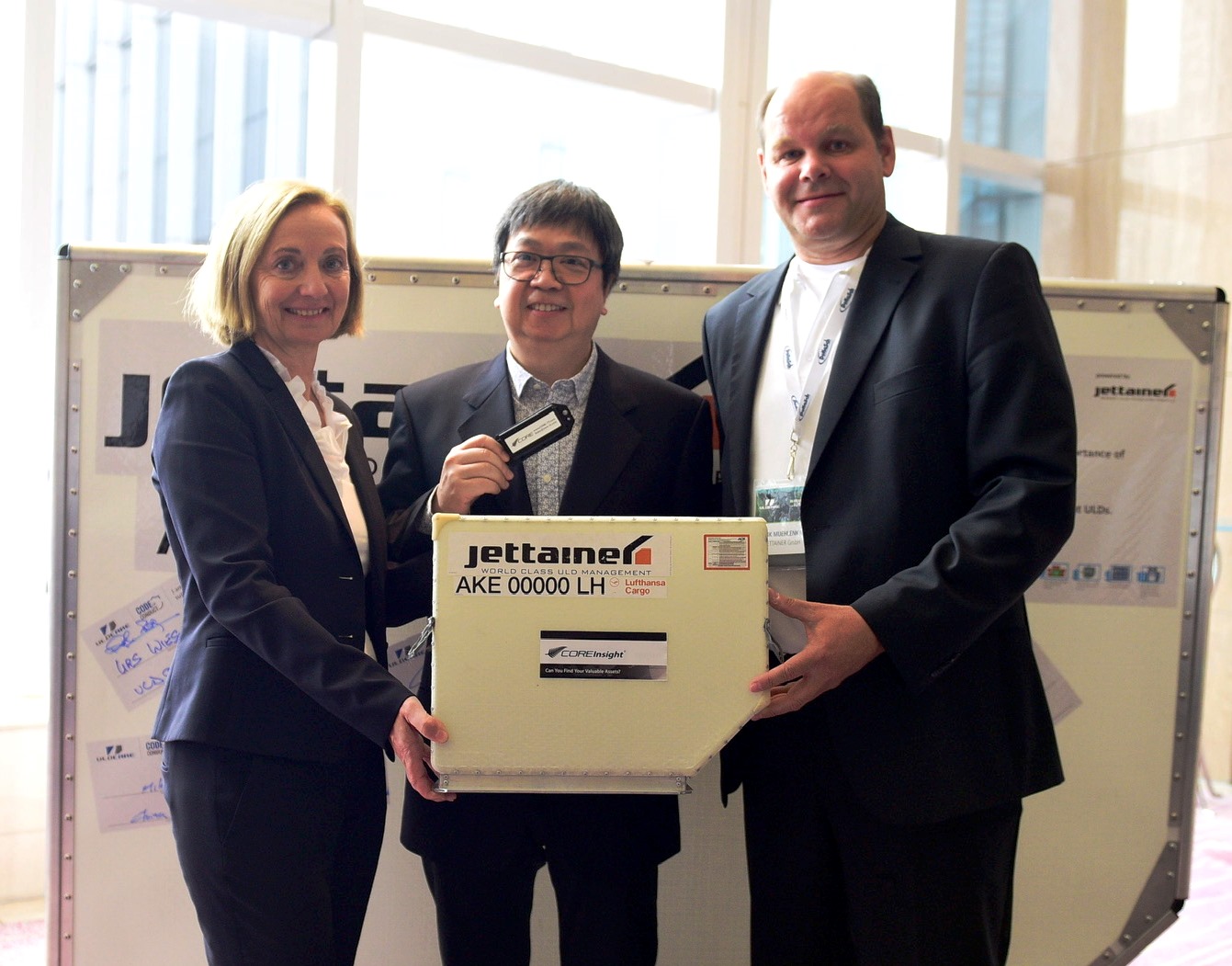 Ingeborg Manz-Maier, director of finance at Jettainer, and Frank Mühlenkamp, director pperations at Jettainer (right), with Frank Hung, executive VP of sales and marketing at CORE Transport Technologies Inc., at ULD Care