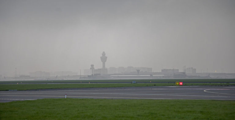 image of foggy Amsterdam airport