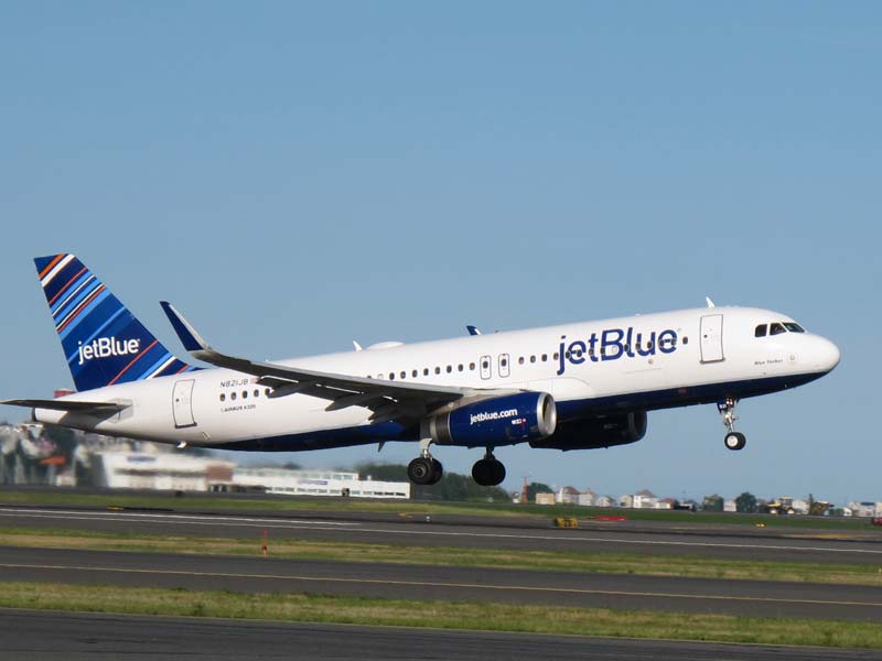 A JetBlue [plane takes off