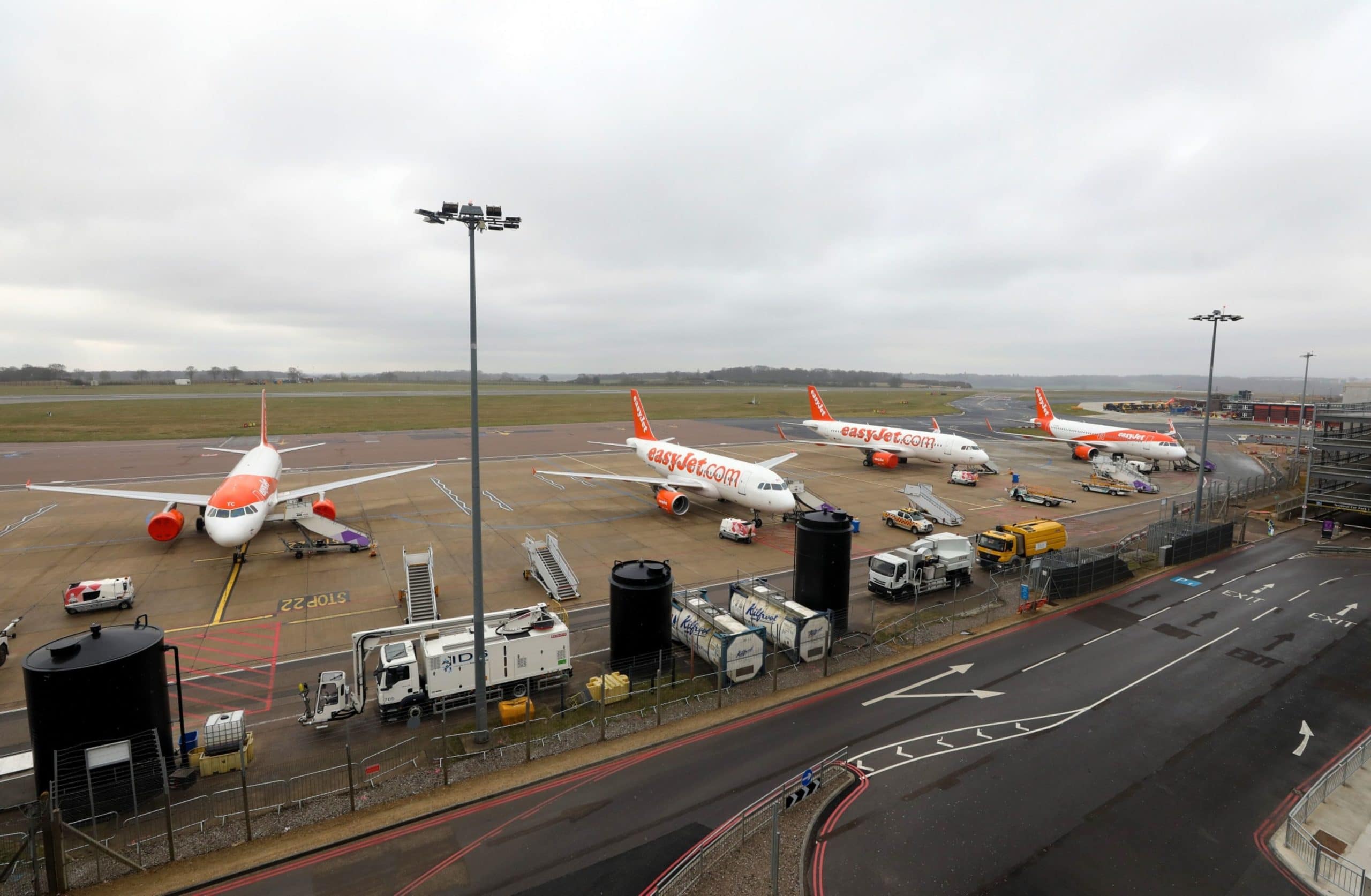 Passenger aircraft, operated by Easyjet Plc, sit parked at London Luton Airport in Luton, U.K., on Monday, March 30, 2020. EasyJet grounded its entire fleet after completing customer-repatriation flights, and said it's in talks to build a cash cushion to see it through the gap in business caused by the coronavirus. Photo: Bloomberg