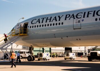 A Cathay Pacific plane sits on the tarmac in Pittsburgh