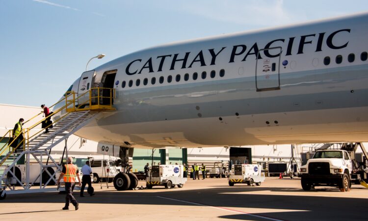 A Cathay Pacific plane sits on the tarmac in Pittsburgh