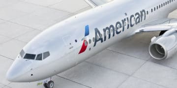 An American Airlines plane sits on the tarmac
