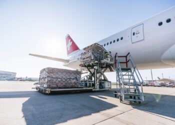 Cargo is loaded onto an airplane