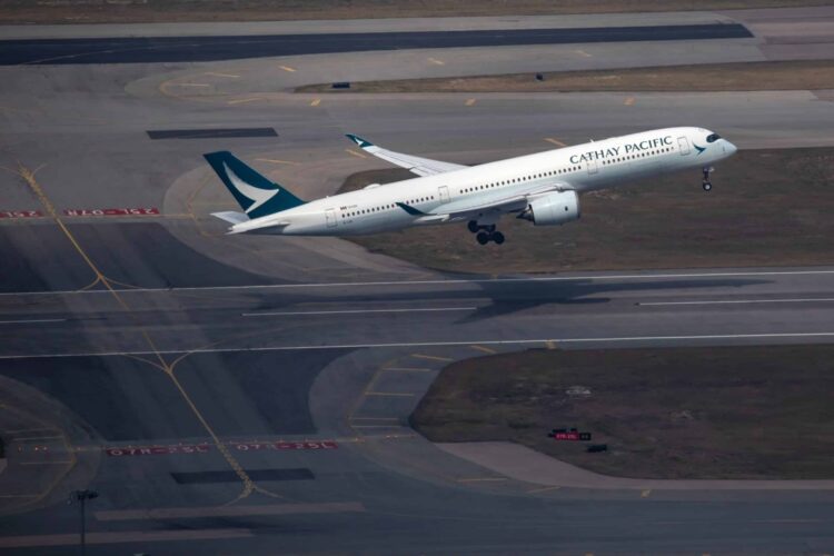 A Cathay Pacific plane takes off from HKG
