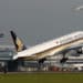A Singapore Airlines plane takes off