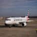 An American Airlines plane taxis to a gate after the FAA lifted a ground stop at Bill and Hillary Clinton National Airport (LIT) in Little Rock, Arkansas, US, on Wednesday, Jan. 11, 2023. Airlines began resuming flights after a system outage led US authorities to temporarily ground planes nationwide early Wednesday, a dramatic disruption to the air-traffic system expected to cause ongoing delays and cancellations. Photographer: Al Drago/Bloomberg