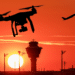Drone flying over sunset