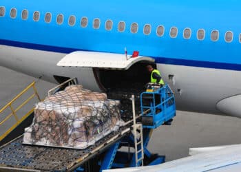Cargo is loaded onto an airplane.