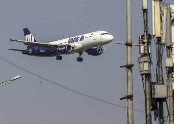 An aircraft operated by Go Airlines India prepares to land in Mumbai.