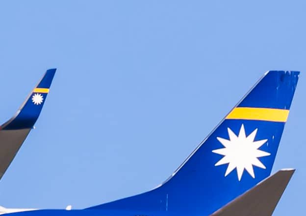The tail of a Nauru Airlines plane
