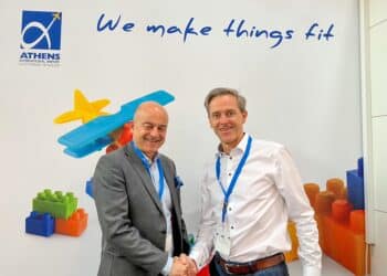 Reps from Athens International Airport and Nallian shake hands