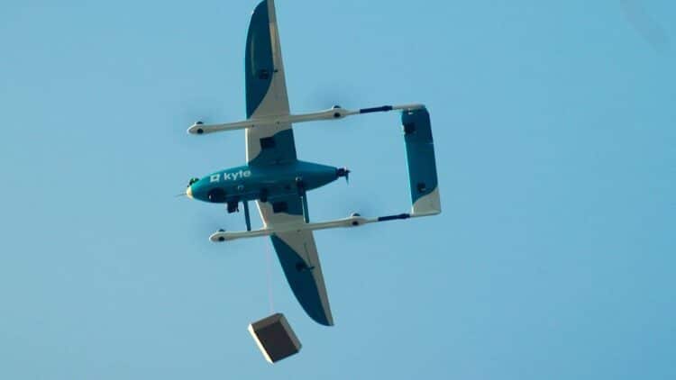 A Kyte drone drops off a package