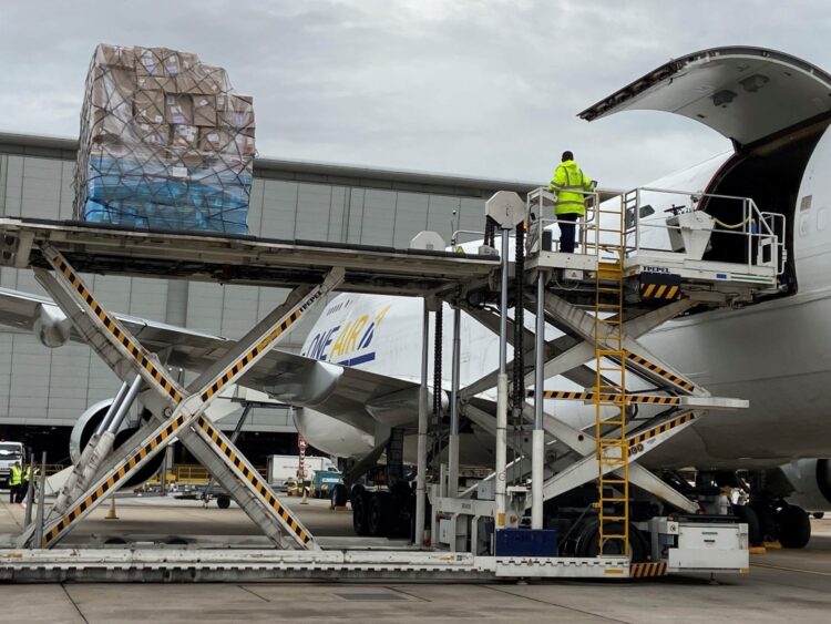 Cargo is unloaded from a One Air plane