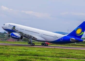 A RwandAir plane takes off from the runway