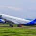 A RwandAir plane takes off from the runway