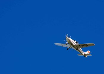 A plane against a blue sky