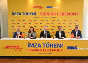 Executives from DHL Group and MNG Kargo sign an agreement