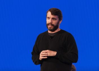 Ryan Petersen speaks against a blue background