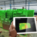 A cargo shipment is outlined in green, to visualize it being scanned by AI