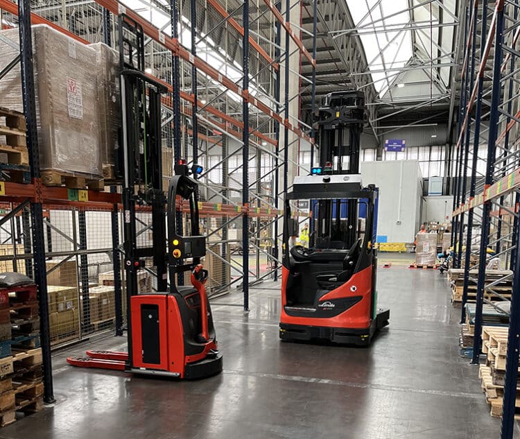 Two AGVs in a cargo warehouse