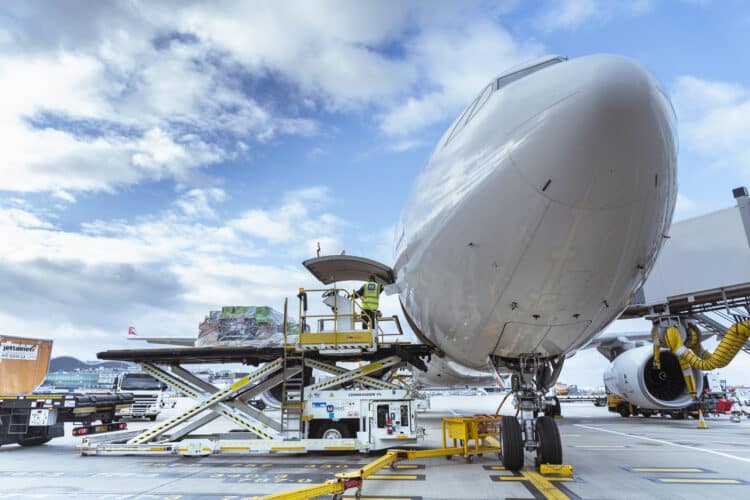 A cargo plan being loaded on the tarmac
