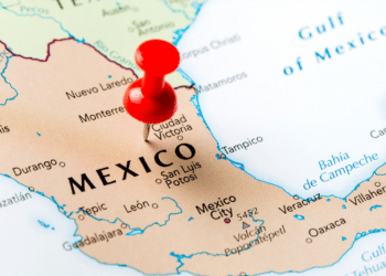 A map of Mexico with a push pin in it