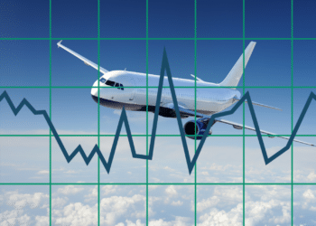 An airplane in the sky with a grid and line chart superimposed over it