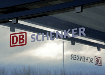 A closeup of the DB Schenker sign on a building