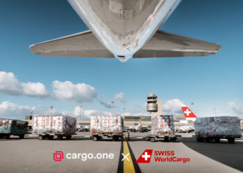 Cargo waits to be loaded onto a Swiss plane on the tarmac